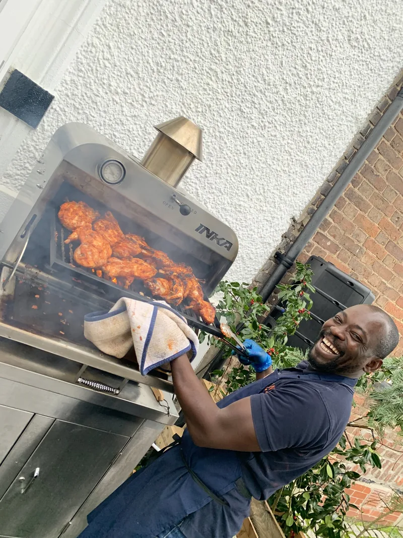Kweku, chef consultant, at the grill